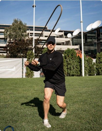 Conor training with a rope outdoors
